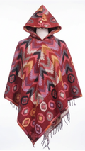 Hooded poncho with geometric pattern on a white background
