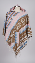 Patterned poncho with fringes on a mannequin against a gray background